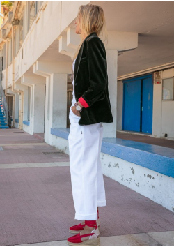 Le véritable pantalon blanc de raseteur